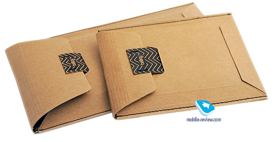 У посилці кожен гаманець упакований в конверт з твердого картону і обгорнутий папером для захисту